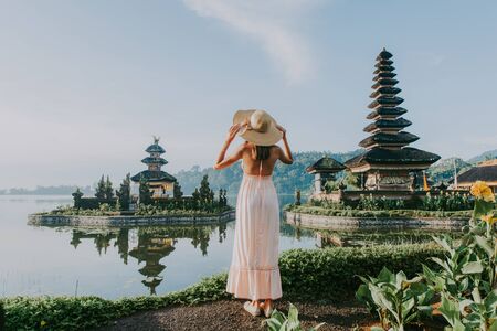Young woman  at the Pura Ulun Danu Bratan, Bali.の写真素材