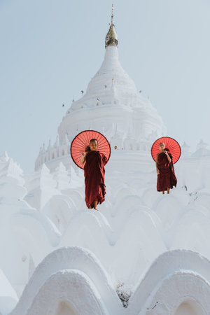 MANDALAY, HSINBYUME PAGODA, MYANMAR . MARCH 1ST 2019. Children monks spending time together at the pagoda. In myanmar childrens start the training to become monks at the age of sevenのeditorial素材