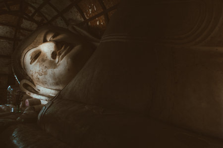 Lying down buddha statue in a temple in Bagan, Myanmarのeditorial素材