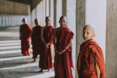MANDALAY, MYANMAR . MARCH 1ST 2019. Children monks spending time together. In myanmar childrens start the training to become monks at the age of sevenのeditorial素材