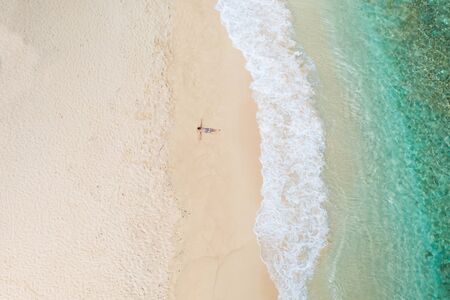 Tropical beach with blue water