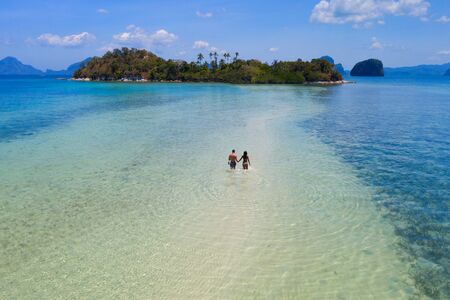 Tropical beach with blue water