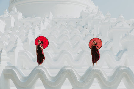 MANDALAY, HSINBYUME PAGODA, MYANMAR . MARCH 1ST 2019. Children monks spending time together at the pagoda. In myanmar childrens start the training to become monks at the age of sevenのeditorial素材