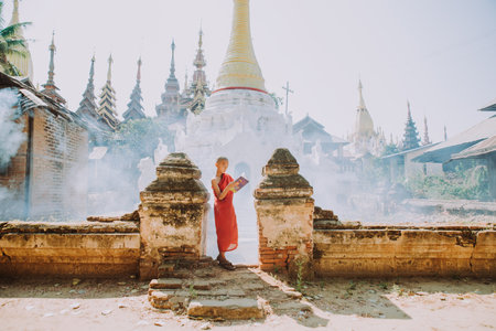 BAGAN, MYANMAR. 28TH FEBRUARY 2019. Portrait of  local little buddhist monks. In myanmar childrens start training for becoming monks at the age of 7のeditorial素材