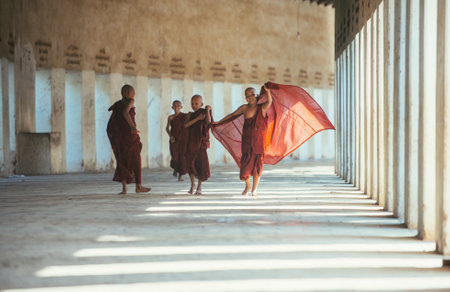 MANDALAY, MYANMAR . MARCH 1ST 2019. Children monks spending time together. In myanmar childrens start the training to become monks at the age of sevenのeditorial素材