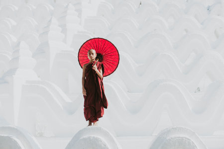MANDALAY, HSINBYUME PAGODA, MYANMAR . MARCH 1ST 2019. Children monks spending time together at the pagoda. In myanmar childrens start the training to become monks at the age of sevenのeditorial素材