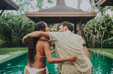Happy couple spending time in a beautiful vacation house