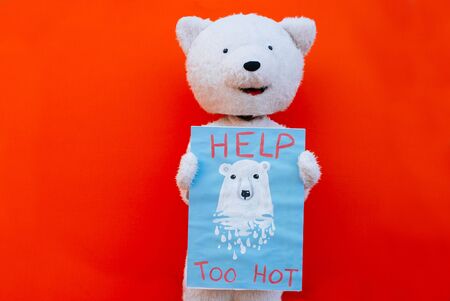 Polar bear character with a message for humanity, about global warming and pollution problems on our planetの写真素材