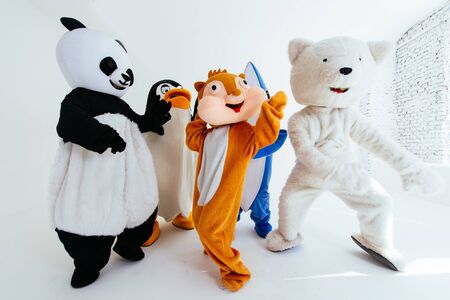 Group of mascots doing party. Concept about carnival, animals rights and lifestyleの写真素材