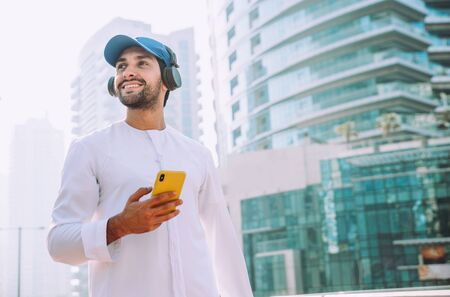Beautiful middle eastern man wearing kandora traditional outfit in Dubai. Portraits in the emirates