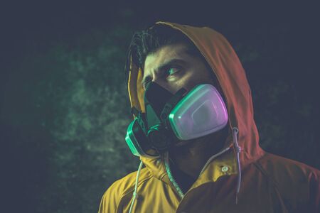 Artistic portraits with man wearing safety mask. Concept about covid19 and coronavirusの写真素材