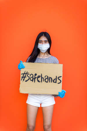 Asian girls with face masks bonding outdoors during pandemic and social distance era - Concepts...