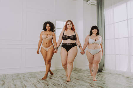 Group of 3 oversize women posing in studio - Beautiful girls accepting body imperfection, beauty...