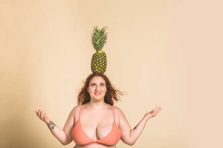 Group of 3 oversize women posing in studio - Beautiful girls accepting body imperfection, beauty shots in studio - Concepts about body acceptance, body positivity and diversityの写真素材