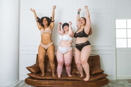 Group of 3 oversize women posing in studio - Beautiful girls accepting body imperfection, beauty...