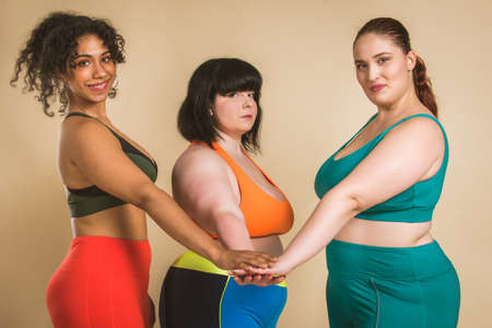 Group of 3 oversize women posing in studio - Beautiful girls accepting body imperfection, beauty...