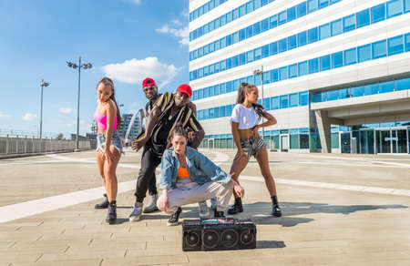 Hip hop crew dancing - Multiracial group of people having fun outdoors
