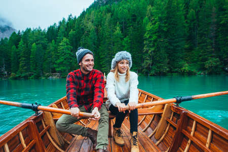 Mountain stories. Happy couple on a wanderlust vacation. Boyfriend and girlfriend spending time...