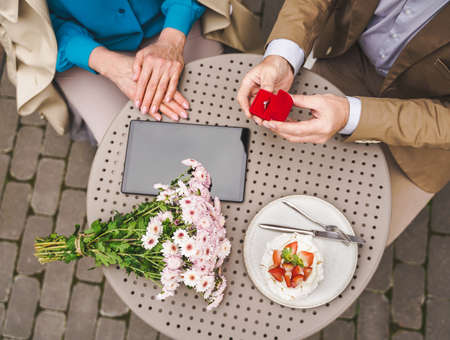 Beautiful senior couple dating outdoors - Mature couple celebrating marrige proposal, concepts about...