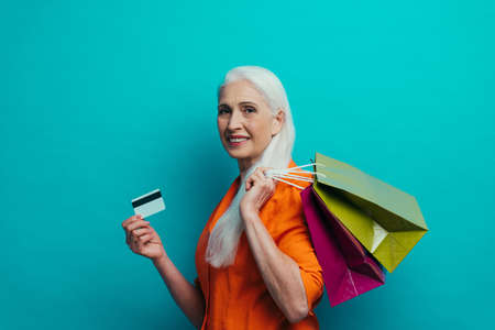 Beautiful senior woman posing on a photoshooting. Concept about lifestyle and seniority
