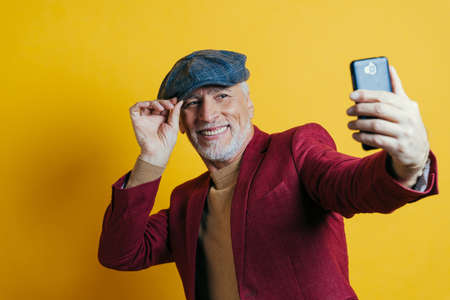 Beautiful senior man posing on a photoshooting