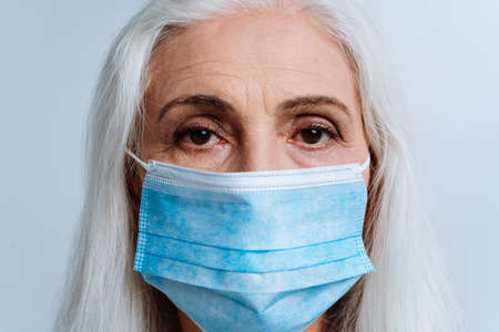 Beautiful senior woman posing on a photoshooting. Concept about lifestyle and seniority