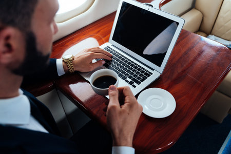 Businessman flying on his private jet. Concept about business, and transportation