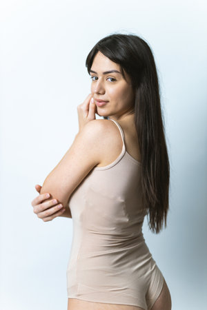 Beautiful woman posing in underwear - Pretty girl portrait, concepts about multicultural people, inclusive society and body positivityの写真素材