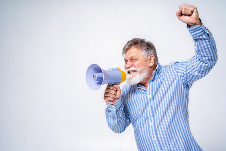 Eccentric senior man with funny expression portrait on background - Active and youthful old maleの写真素材
