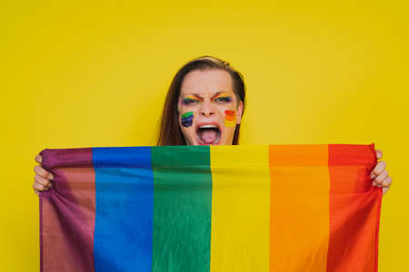 Transgender fighting for lgbtq community rights - Transsexual male portrait, conceptual support for gay people, lesbians, transgender and against homophobiaの写真素材