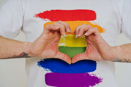 Transgender fighting for lgbtq community rights - Transsexual male portrait, conceptual support for gay people, lesbians, transgender and against homophobiaの写真素材