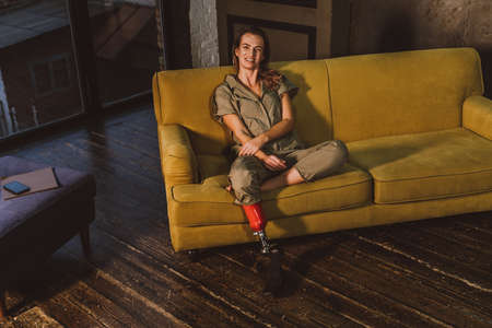 Beautiful young woman with amputation - Pretty and confident woman with leg disability, amputee...