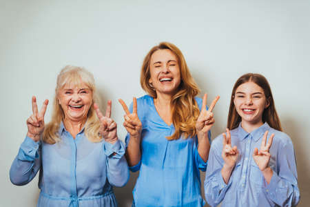 Grandmother, daughter and grandchild together at home, happy domestic life moments - Family having...