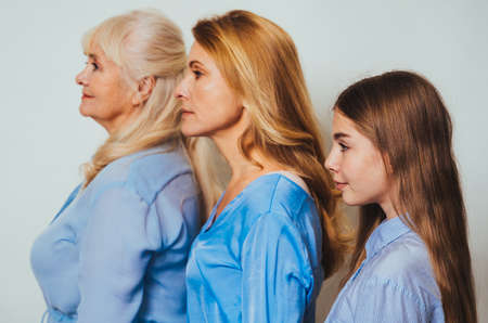 Grandmother, daughter and grandchild together at home, happy domestic life moments - Family having fun, concepts about elderly, mult-generation family and relationshipの写真素材