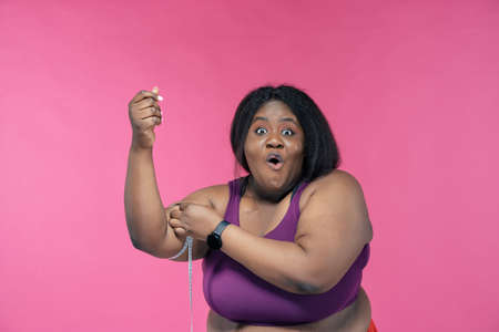 Young woman making pilates and functional training at the gym. Concept about sport, fitness and weight lossの写真素材