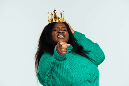 Image of a beautiful woman posing in casual clothes on a white backgroundの写真素材