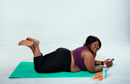 Young woman making pilates and functional training at the gym. Concept about sport, fitness and weight lossの写真素材