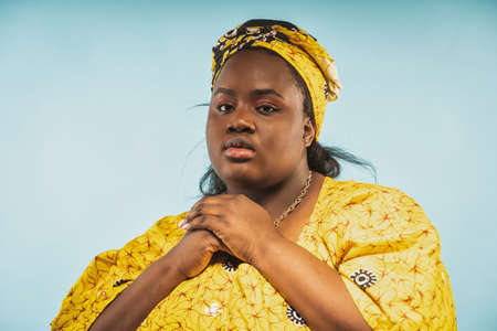 image of a beautiful woman from africa wearing traditional clothes. Concept about lifestyle and cultureの写真素材