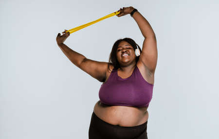 Young woman making pilates and functional training at the gym. Concept about sport, fitness and weight lossの写真素材