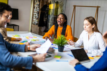 Project managers and employees brainstorming on ideas - Multi-ethnic group of workers having...
