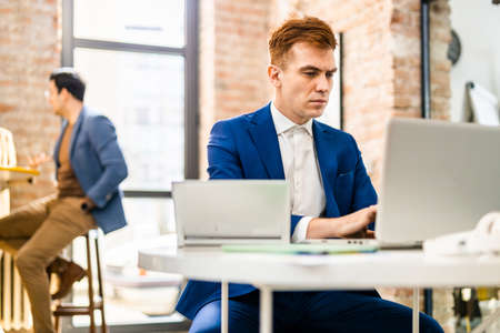 Project managers and employees brainstorming on ideas - Multi-ethnic group of workers having business meeting in a start-up officeの写真素材