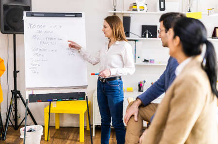 Project managers and employees brainstorming on ideas - Multi-ethnic group of workers having business meeting in a start-up officeの写真素材