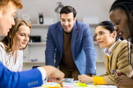 Project managers and employees brainstorming on ideas - Multi-ethnic group of workers having...