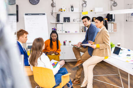 Project managers and employees brainstorming on ideas - Multi-ethnic group of workers having...