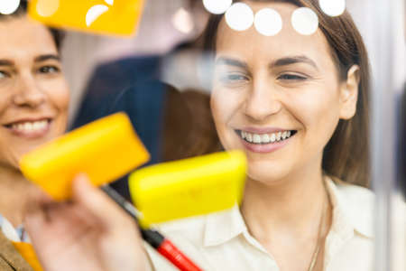 Business company employee brainstorming new ideas for marketing plan - Entrepreneur with colored...