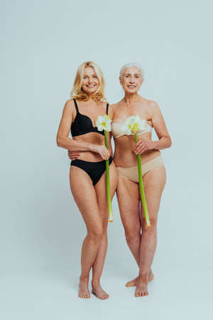 Beautiful senior women with young and clean look, beauty shot - Pretty senior ladies over 60 with perfect skin, concepts about elderly, beauty treatment and skin careの写真素材