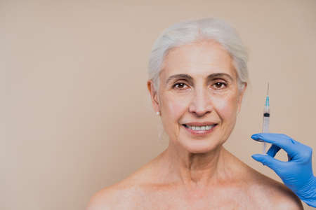 Beautiful senior women with young and clean look, beauty shot - Pretty senior ladies over 60 with perfect skin, concepts about elderly, beauty treatment and skin careの写真素材