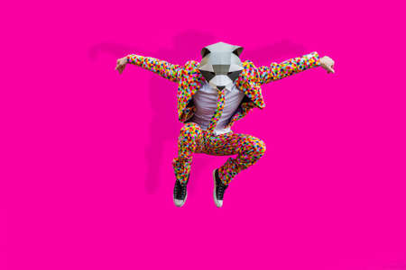 Happy man with funny low poly mask on colored background - Creative conceptual idea for advertising,...