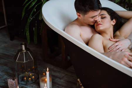 young couple spending time in their beautiful countryside house. Romantic lifestyle moments