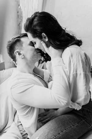 young couple spending time in their beautiful countryside houseの写真素材